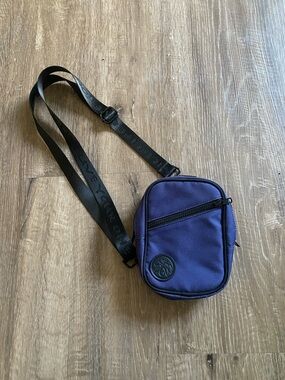 Compact Purple Crossbody Bag with Adjustable Logo Strap